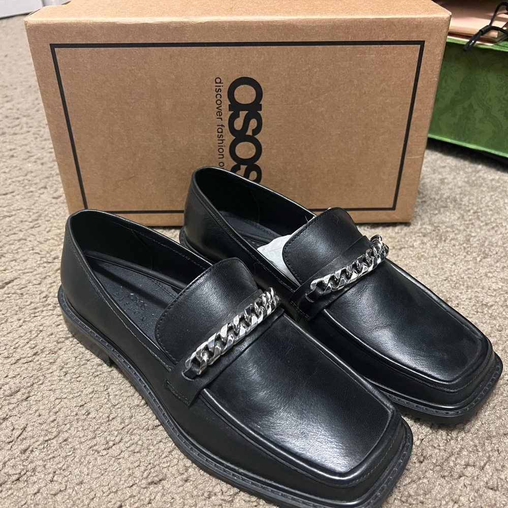 Black leather loafers